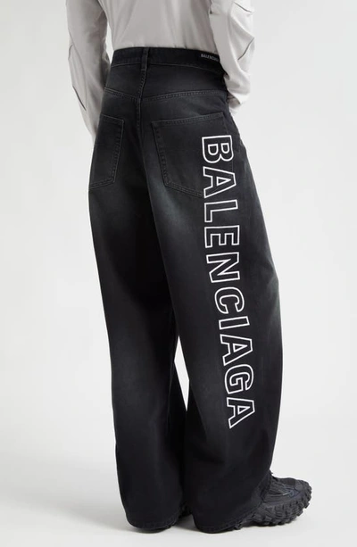 Shop Balenciaga Logo Graphic Denim Baggy Jeans In Sunbleached Black