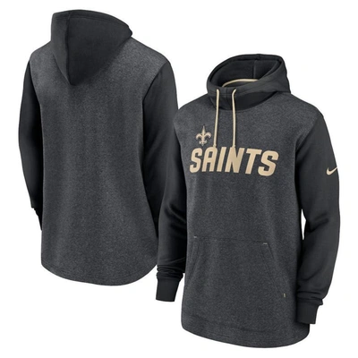 Shop Nike Heathered Charcoal/black New Orleans Saints Surrey Legacy Pullover Hoodie In Heather Charcoal