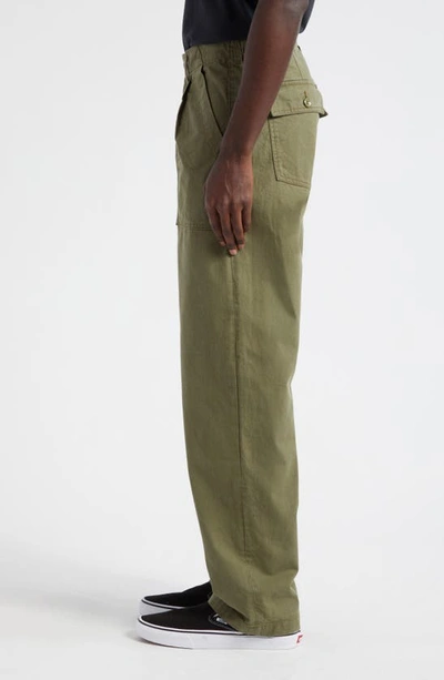 Shop Noah Pleated Cotton Twill Utility Pants In Army Green