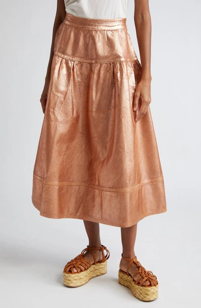 Shop Ulla Johnson The Astrid Metallic Denim Tiered Skirt In Copper Foiled Wash