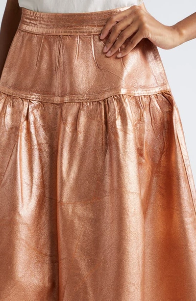 Shop Ulla Johnson The Astrid Metallic Denim Tiered Skirt In Copper Foiled Wash