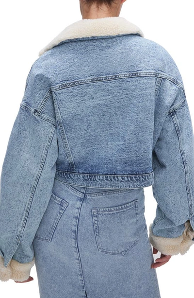 Shop Good American Uniform Faux Shearling Crop Denim Jacket In Blue585