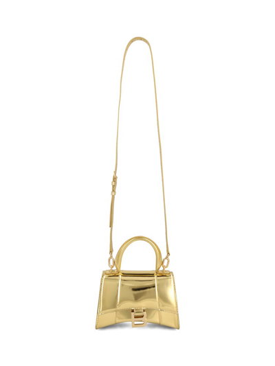Shop Balenciaga Hourglass Mirror Effect Xs Handbag In Gold
