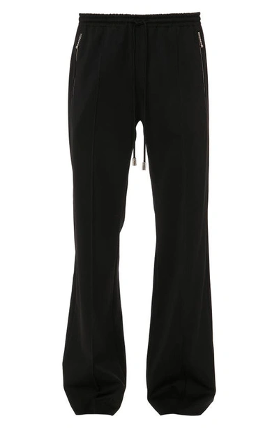 Shop Jw Anderson Bootcut Track Pants In Black