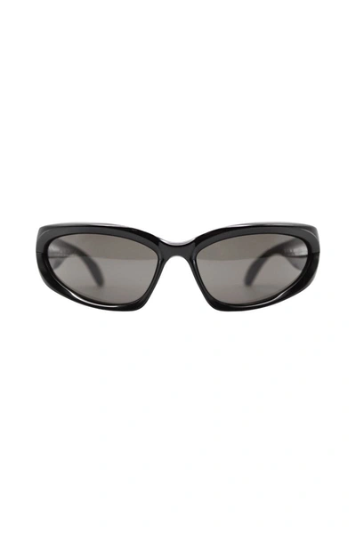 Shop Balenciaga Swift Oval 0157s Sunglasses Accessories In Black