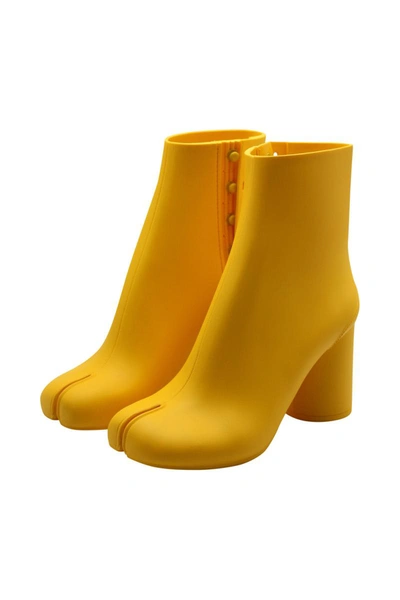 Shop Maison Margiela Rubber Tabi Boots Shoes In Yellow & Orange