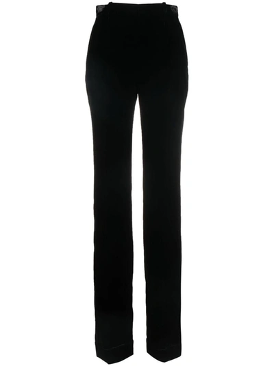 Shop Saint Laurent High Waist Flared Velvet Trousers In Black