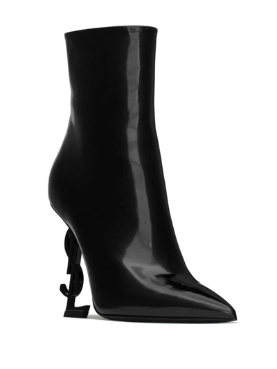 Shop Saint Laurent Opyum Leather Heel Ankle Boots In Black