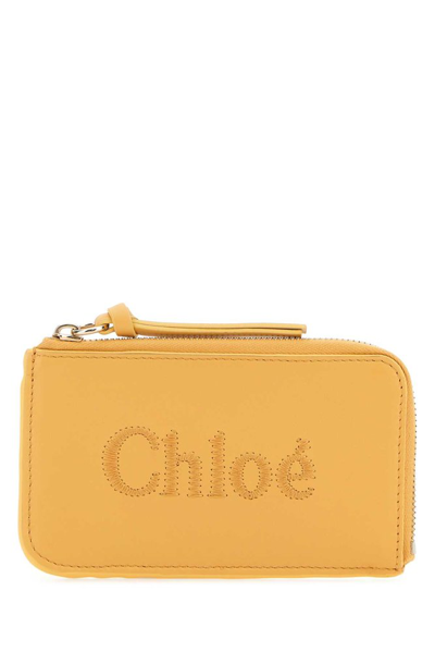 Shop Chloé Logo Embroidered Zipped Cardholder In Yellow