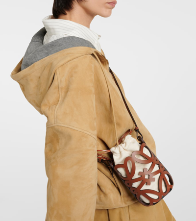 Shop Loewe Anagram Leather And Canvas Pouch With Strap In Brown