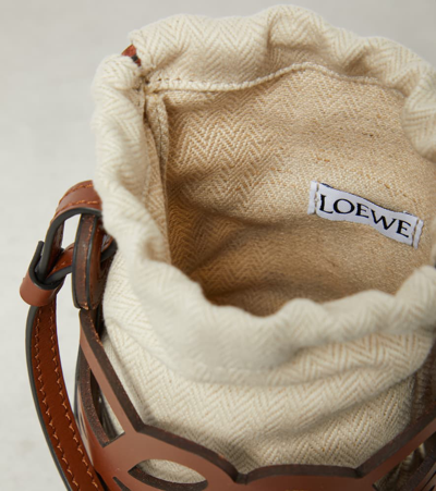 Shop Loewe Anagram Leather And Canvas Pouch With Strap In Brown