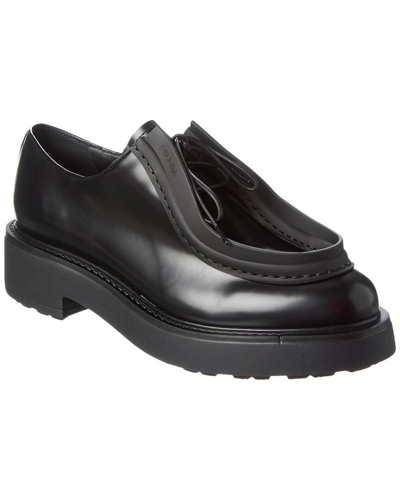 Shop Prada Brushed Leather Loafer In Black