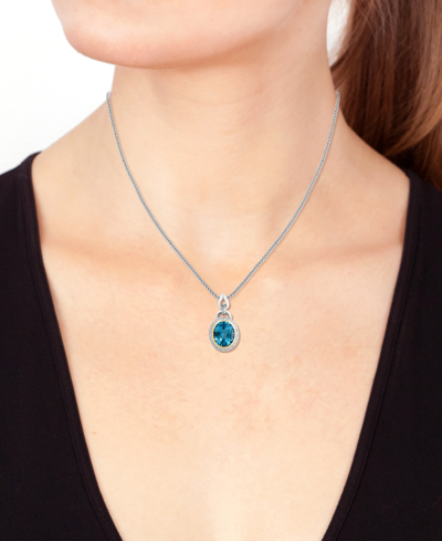 Shop Effy Collection Effy Blue Topaz (5-7/8 Ct. T.w.) & Diamond (1/10 Ct. T.w.) Halo 18" Pendant Necklace In Sterling Sil In K Gold Over Silver