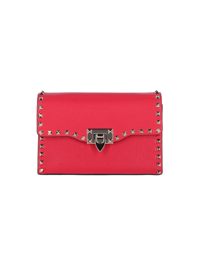 Shop Valentino Small Crossbody Bag "rockstud" In Red