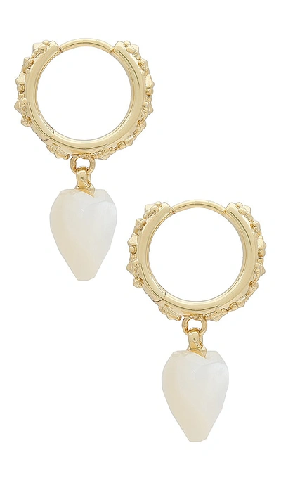 Shop Kendra Scott Penny Heart Huggie Earrings In Ivory Mother Of Pearl