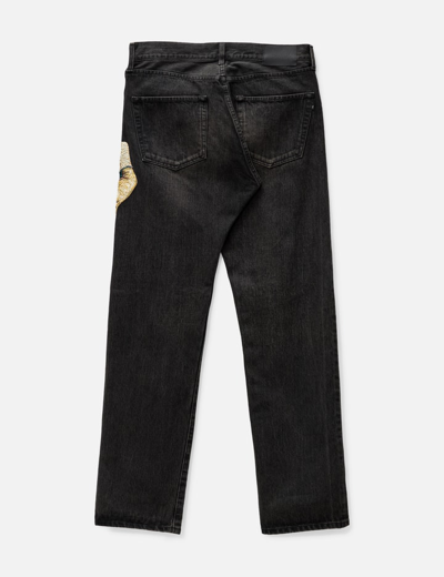 Shop Undercover Embellished D-hand Denim Pants In Black