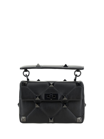 Shop Valentino Garavani Roman Stud Foldover Top Shoulder Bag In Black
