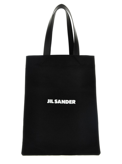 Shop Jil Sander Logo Printed Medium Flat Shopper Bag In Black
