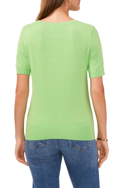 Shop Vince Camuto Crewneck Short Sleeve Jersey Sweater In Melon Green