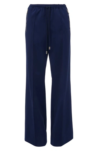 Shop Jw Anderson Bootcut Track Pants In Oxford Blue