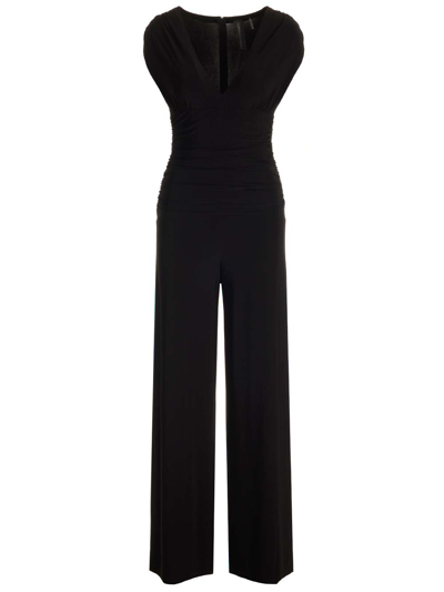 Shop Norma Kamali Ruched Plunge Jumpsuit In Black