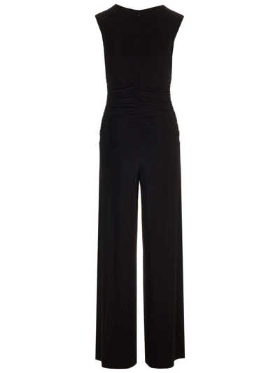 Shop Norma Kamali Ruched Plunge Jumpsuit In Black