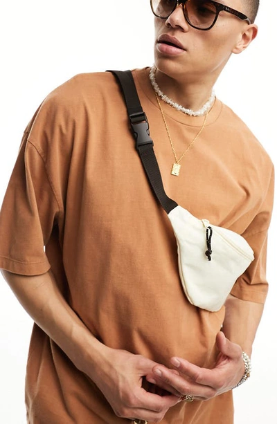Shop Asos Design Oversize Cotton Crewneck T-shirt In Brown