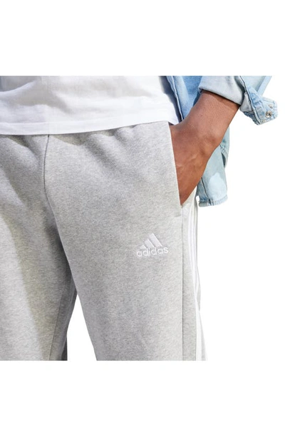 Shop Adidas Originals Essentials 3-stripes Fleece Sweatpants In Medium Grey Heather