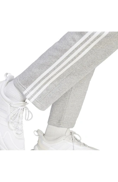 Shop Adidas Originals Essentials 3-stripes Fleece Sweatpants In Medium Grey Heather
