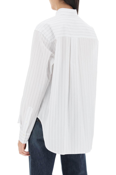Shop Totême Pinstriped Boxy Shirt In White