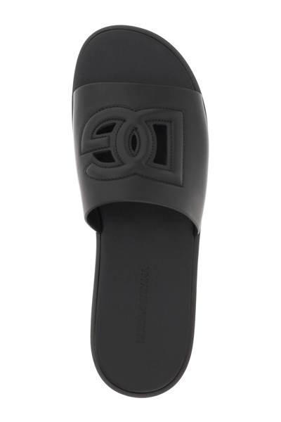 Shop Dolce & Gabbana Leather Slides With Dg Cut-out In Black
