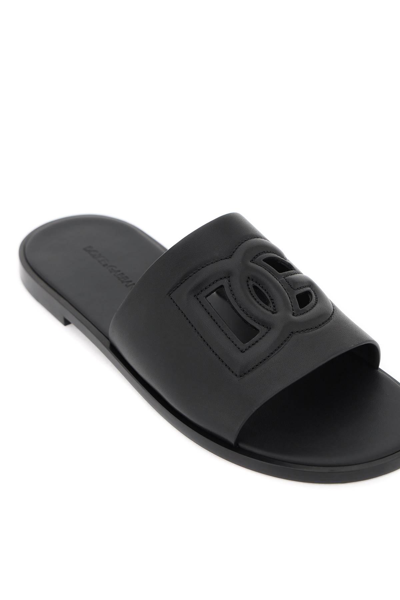 Shop Dolce & Gabbana Leather Slides With Dg Cut-out In Black