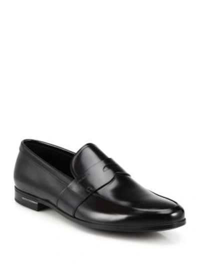 Shop Prada Spazzolato Leather Penny Loafers In Black