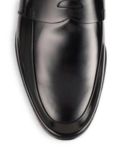 Shop Prada Spazzolato Leather Penny Loafers In Black