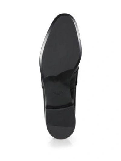 Shop Prada Spazzolato Leather Penny Loafers In Black