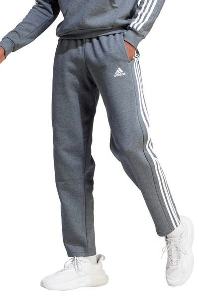 Shop Adidas Originals Adidas Essentials 3-stripes Fleece Sweatpants In Dark Grey Heather