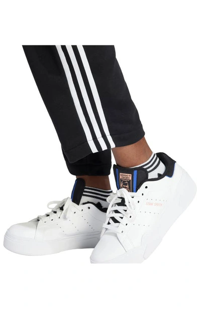 Shop Adidas Originals Open Hem Loose Ankle Joggers In Black