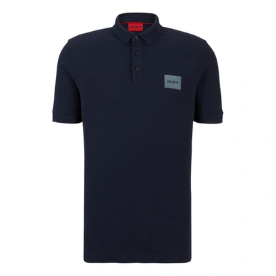 Shop Hugo Cotton-piqu Polo Shirt With Metallic-effect Logo In Blue