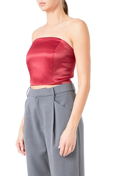 Shop Endless Rose Strapless Satin Crop Top In Ruby