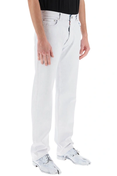 Shop Maison Margiela Jeans In Coated Denim Men In White