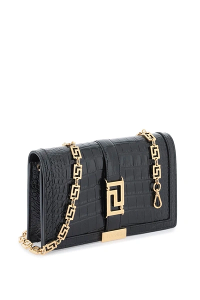 Shop Versace Croco-embossed Leather Greca Goddes Crossbody Bag Women In Black