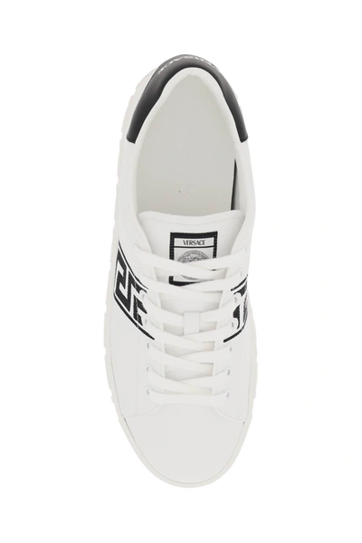 Shop Versace Greca Sneakers Men In White
