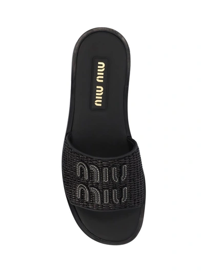 Shop Miu Miu Sandals In Black