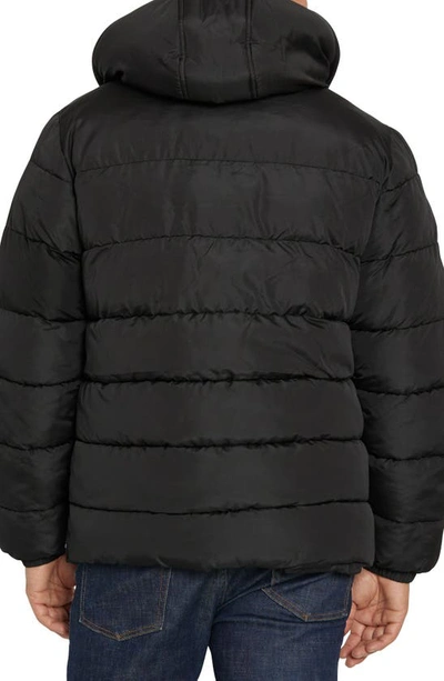 Shop Izod Faux Shearling Lined Quilted Jacket In Solid Black