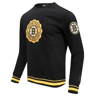 Pro Standard Men's  Black Boston Bruins Crest Emblem Pullover Sweatshirt In Black