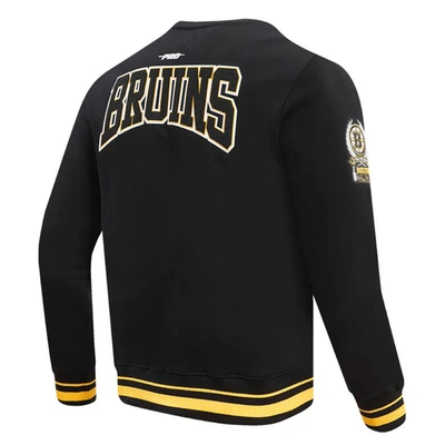 Pro Standard Men's  Black Boston Bruins Crest Emblem Pullover Sweatshirt In Black