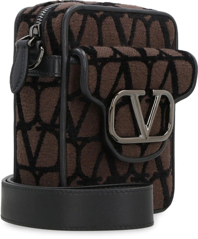 Shop Valentino Garavani - Locò Mini Crossbody Bag In Brown