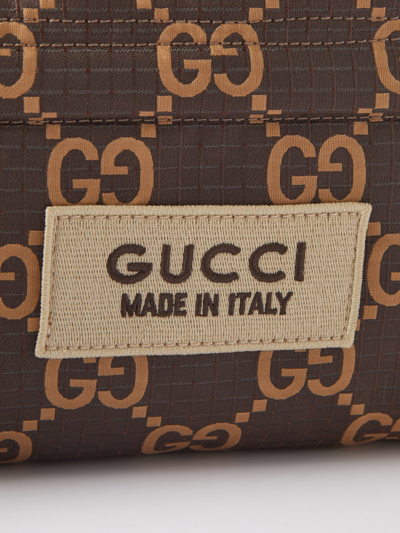 Shop Gucci Men Gg Ripstop Nylon Crossbody Bag In Brown