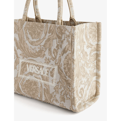 Shop Versace Womens Beige Beige  Gold Logo-print Medium Woven-blend Tote Bag
