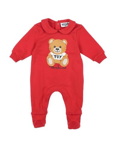 Shop Moschino Baby Newborn Baby Jumpsuits & Overalls Tomato Red Size 3 Cotton, Elastane